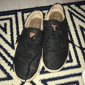 Toms sneakers.
